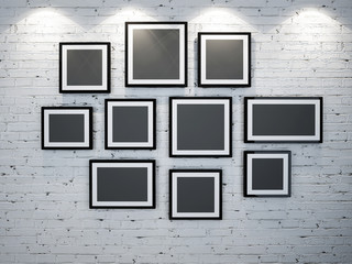 frames on brick wall