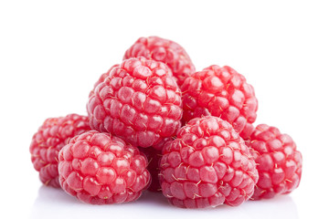 Ripe raspberrys isolated on a white background