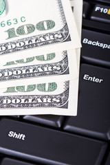 Dollar Banknotes on Keyboard