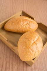 Bread in wooden tray