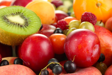 Assortment of juicy fruits   background