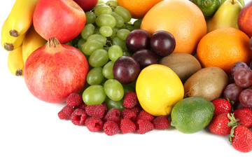 Different fruits on white background