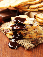 Biscotti with  nuts, on wooden background