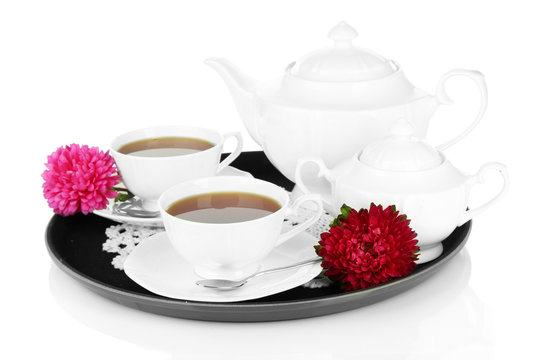 Cups of tea on tray isolated on white