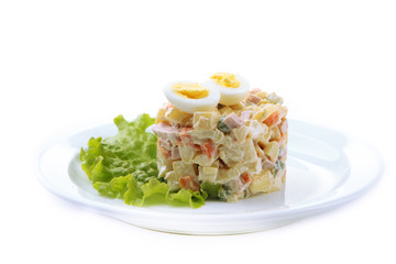 Russian traditional salad Olivier, isolated on white