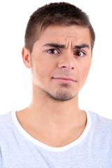 Obraz premium Przystojny młody mężczyzna na białym tle