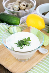 Cucumber yogurt in glass bowl,