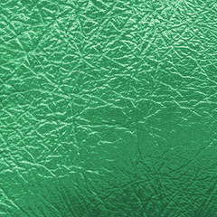green leather texture closeup.