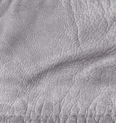 Obraz premium light crumpled leather texture closeup, stitch
