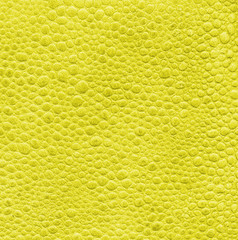 yellow leather texture closeup.