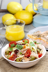 Salmon salad on wooden table