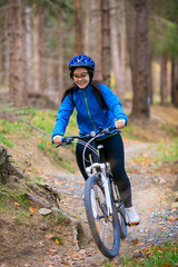 Naklejka premium Healthy lifestyle - teenage girl biking