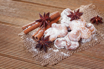 Cookies with anise stars and cinnamon on sacking