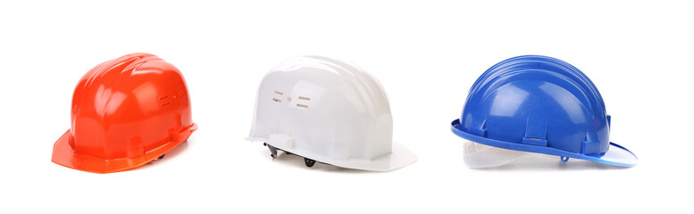 Fototapeta premium White red and blue hard hats.