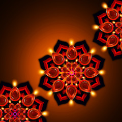 oil lamp with diwali diya elements over dark background