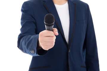 Naklejka premium news reporter journalist interviews a person holding up the micr