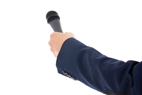 reporter's hand holding a microphone isolated over white