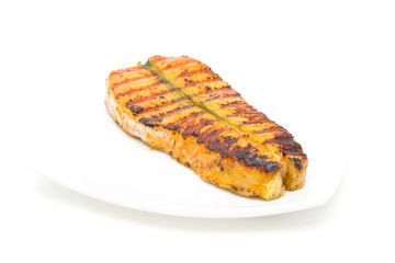 baked salmon on a plate on a white background