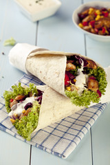 tortilla wraps with meat and vegetables