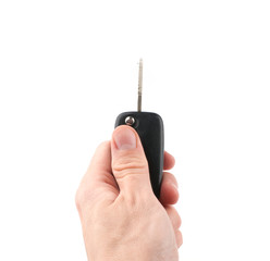 Hand holding car keys isolated on white background