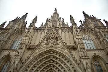 Fototapeta premium Details of facade of main Cathedral of Barcelona in Old Town