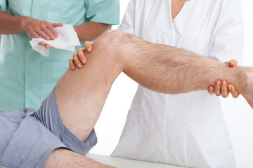 Doctor examining a patient