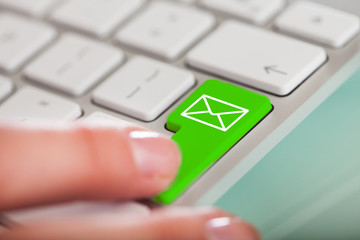 Hand On E-mail Key