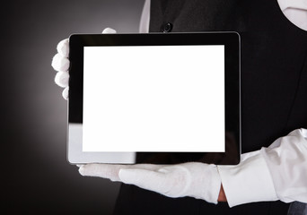 Waiter Holding Digital Tablet