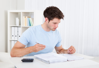 Man Calculating His Bills