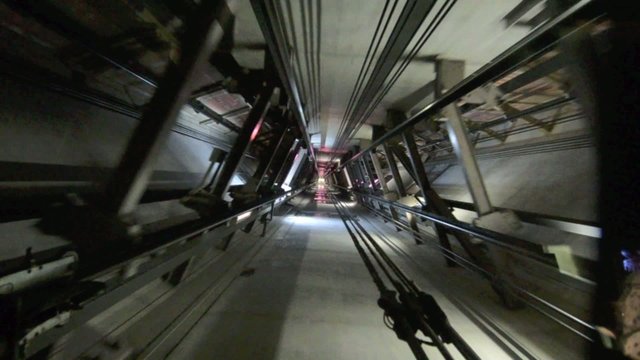 Elevator In motion up and down inside elevator shaft