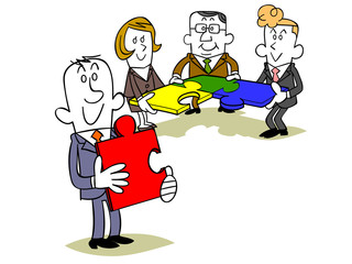 ビジネスマンのチームとパズルのピース