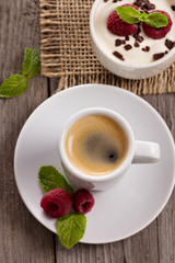 Coffee and cream dessert with raspberries