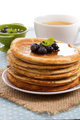 Stacked pancakes with berries