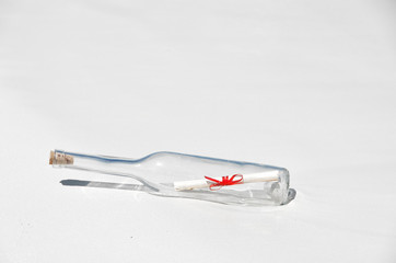 Bottle with a message on the beach