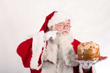 Babbo Natale gusta tipico dolce di Milano