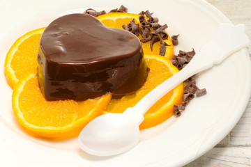 chocolate pudding over orange slices