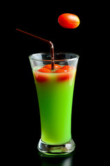 Guava shake drink in glass and tomato