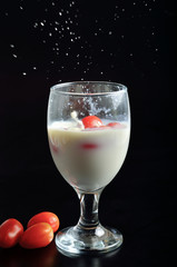 milk splash on black background