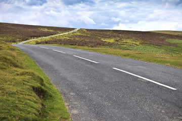 Country road crossing Dartmoor National Park, England