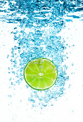 Fototapeta na wymiar Green lime in the Water.