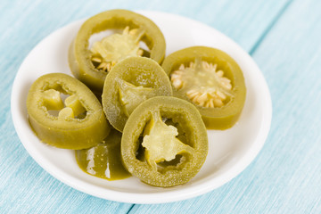 Jalapenos - Bowl of pickled sliced green jalapeno peppers