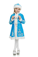 Little girl in blue costume of snow maiden showing snowflake