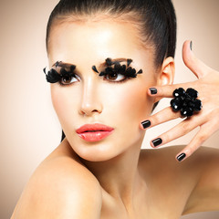 Face of beautiful fashion woman with  black false eyelashes