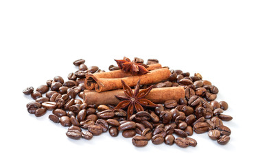 Cinnamon sticks and coffee beans on a white background.