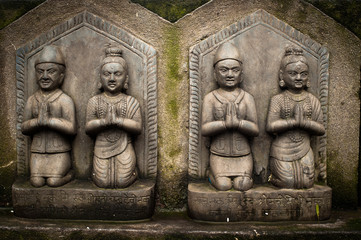 Sculpture of praying peoples. Nepal