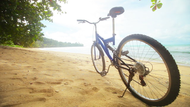 Modern bicycle on a tropical the beach without people