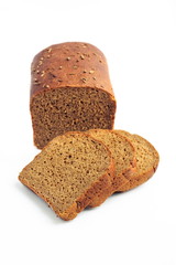 Loaf of rye bread with slices