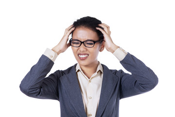 Stressed young businesswoman