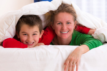 Mother and Son Under Blanket