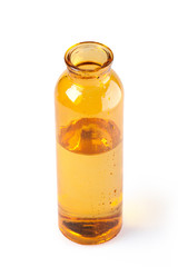 Yellow glass bottle with water with clipping path